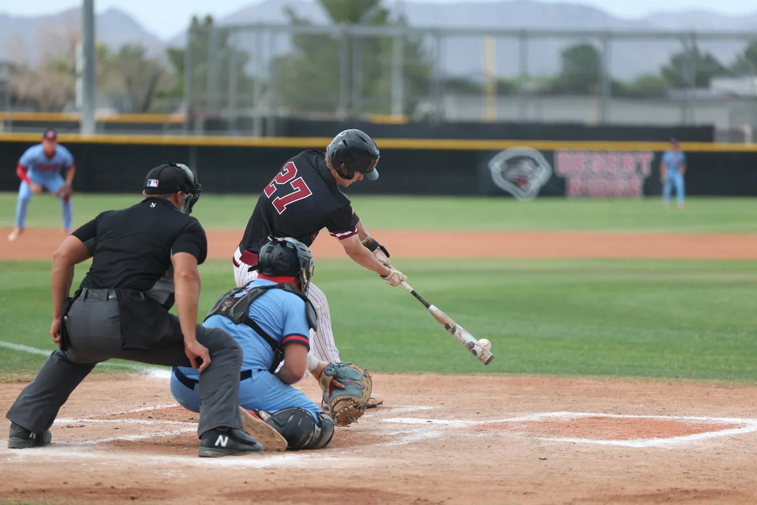 Jaguar swinging the bat at the ball